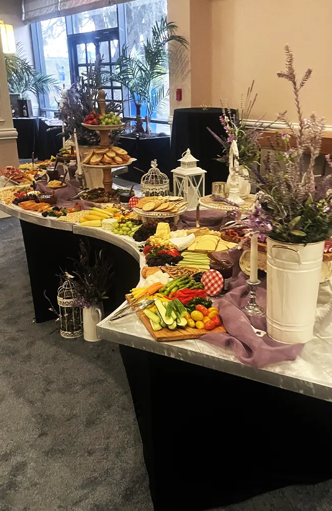 catering grazing tables with cheese and meets for parties and office meetings