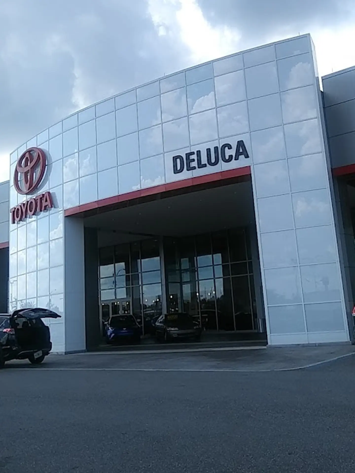 Guests enjoying gourmet spread at DeLuca Toyota mixer